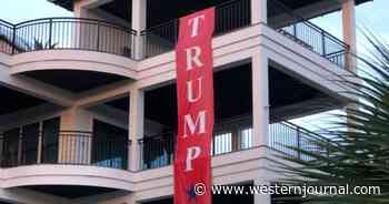Trump Supporter Unfurls 3-Story Banner, Tells County the Bad News When It Begins Fining Him $50 Per Day