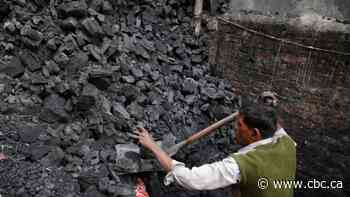 The world is supposed to share the cost of fighting climate change. Here's how that works