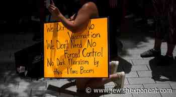 Neo-Nazi Group Hangs 'Vax the Jews' Banner in Austin, Texas - Jewish Exponent