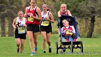 Teen runner pushes brother in wheelchair so they can compete together