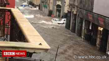Catania: Two dead as rare storm floods streets of Sicilian city