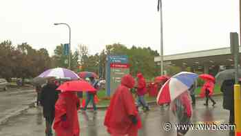 Almost a month into strike, Catholic Health considers pulling striking workers health benefits