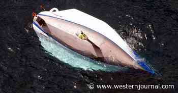 'Greatly Indebted': Three People and Dog Rescued Just in Time as Capsized Sailboat Sinks
