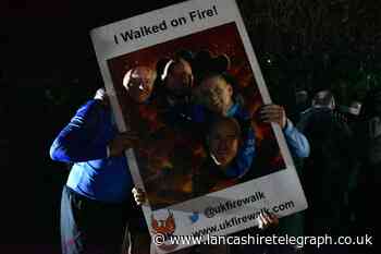 Walking on hot coals was no mean 'feet' for Pendleside Hospice fundraisers