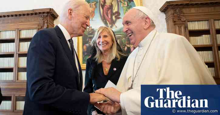 Biden gives Pope Francis sentimental coin and calls him 'warrior for peace' – video
