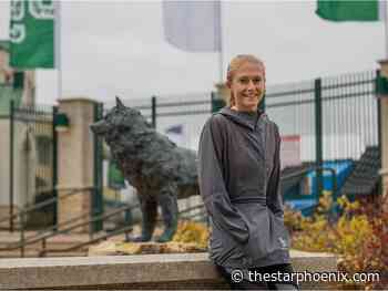 Olympic dreams on hold, Hufsmith happy on Huskies