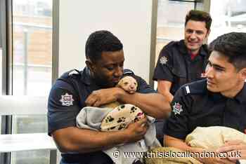 Firefighters pay dogs home a visit in Battersea