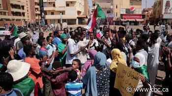 2 demonstrators reported slain in Sudan, as thousands protest military coup