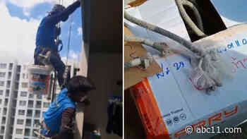 Woman cut rope holding painters, leaving them above Thai condo's 26th floor