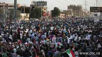 Tens of thousands show up in streets to protest Sudan military coup