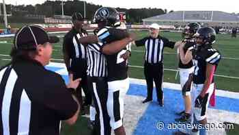 WATCH:  Army dad returns after a year to surprise son at a football game