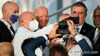 Biden takes selfies with first responders and medical personnel at the G20 summit - CNN