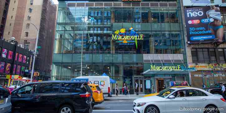 See inside Jimmy Buffett's Margaritaville's $300 million NYC resort with a heated rooftop swimming pool, tiki bars, and plenty of tropical decor