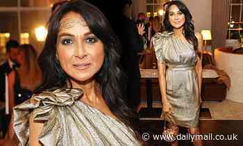 Jackie St Clair, 61, puts on a glamorous display in ruffled gold dress - Daily Mail