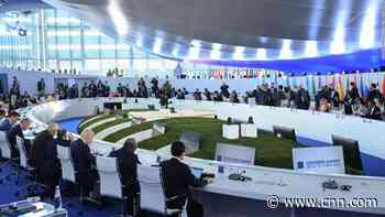 Leaders agree every country must aim to contain temperature rise to 1.5 degrees but make few firm climate commitments