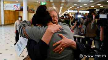 Loved ones reunite as Australia reopens international border for 1st time in pandemic