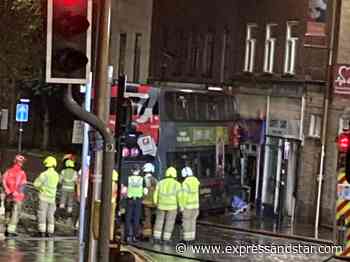 Double-decker bus crashes into Dudley town centre chip shop - expressandstar.com