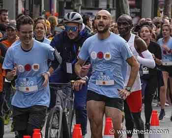 Paris runners race Olympic marathon champion Kipchoge - Toronto Star