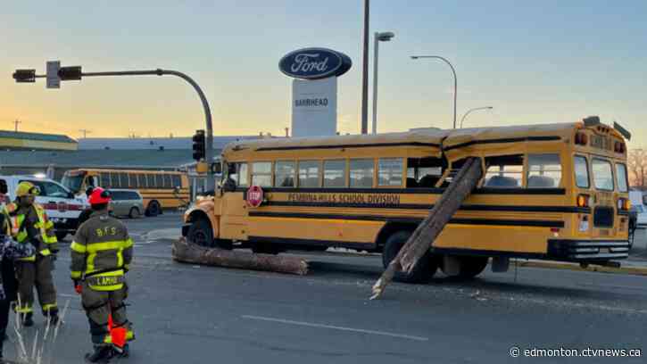 Giant logs slam through school bus with children on board near Edmonton