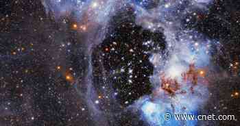 Haunting Hubble image shows mysterious 'superbubble' nebula hole     - CNET