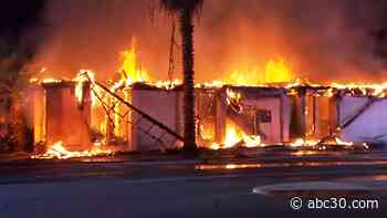 Fresno fire crews rescue 2 people trapped inside burning building