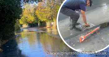 Flooded Gloucester road sees 'whirlpool' effect as councillor clears drain - Gloucestershire Live