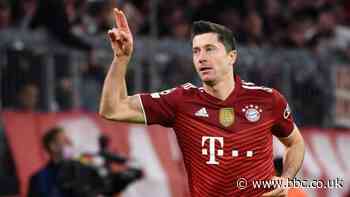 Lewandowski hits hat-trick in 100th Champions League game to send Bayern through