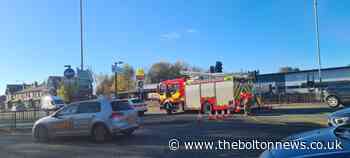 UPDATES: Road closed after man dies in rush hour crash - The Bolton News