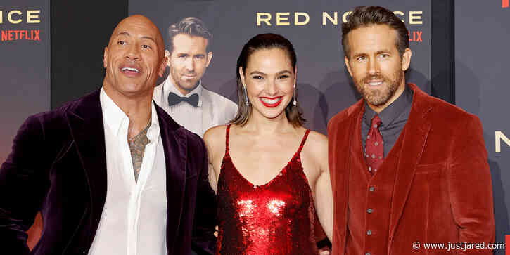 Gal Gadot & Ryan Reynolds Wore Red For 'Red Notice' Premiere With Dwayne Johnson