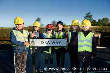 Pupils are first to walk or cycle across Issa Way