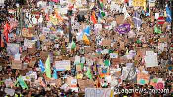 Inside and outside climate talks, youths urge faster action