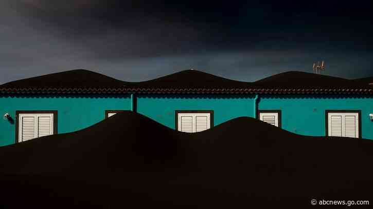 AP PHOTOS: A slow motion burial awaits in volcano no-go zone