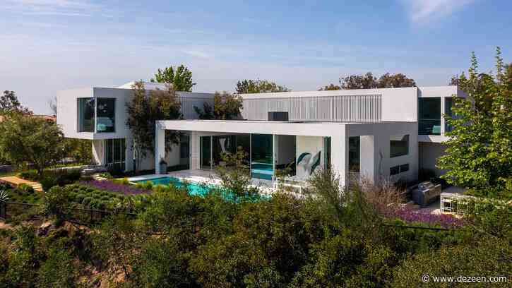 White stucco wraps Getty View Residence by Abramson Architects in Los Angeles