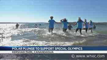 Shivering swimmers defrost in the warmth of a good deed after a chilly dip