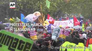Protesters march in Glasgow as climate talks continue