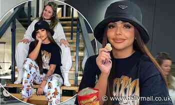 Jesy Nelson nails casual chic in an oversized black T-shirt and Toy Story-inspired joggers - Daily Mail