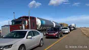 Traffic jams reported on southern Alberta highway as U.S. border reopens
