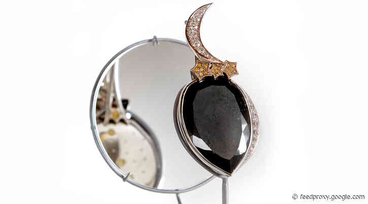 A rare black diamond is displayed at the Natural History Museum