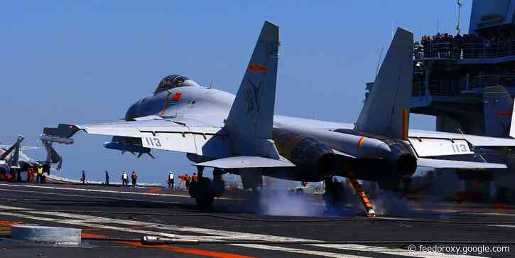 Satellite photos suggest China could launch its newest aircraft carrier in a matter of months, experts say