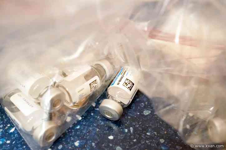 How many booster shots have been given in Travis County?