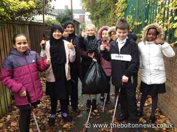 Pupils at Bolton primary school inspire others with litter pick - The Bolton News