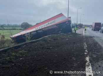 Long delays on M6 motorway after lorry comes off road