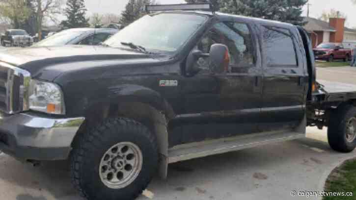 Fort Macleod RCMP looking for public assistance in theft of black flatbed truck, forklift and dump trailer