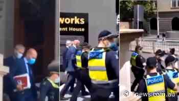 Brett Sutton and Jeroen Weimar abused by protesters outside parliament in Melbourne - 7NEWS