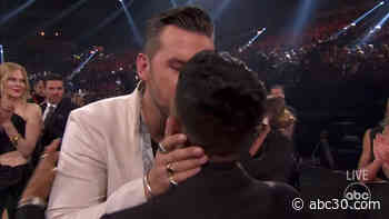T.J. Osborne, openly gay artist advocating for inclusivity, celebrates CMA win by kissing boyfriend