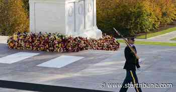 Biden salutes troops as 'spine of America' on Veterans Day