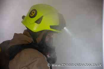 Tolworth flat fire hospitalises two men