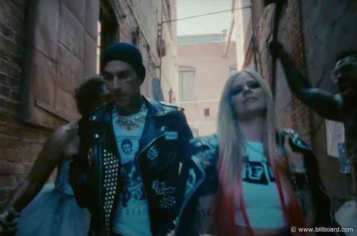 Avril Lavigne & Travis Barker Terrorize an Ex-Boyfriend In ‘Bite Me’ Video: Watch