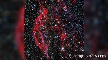 Death of a White Dwarf Star Creates Cosmic Red Ribbons of Gas, NASA Shares Photo