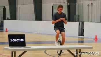 Alberta teen solves Rubik's cube 300 times while riding unicycle, beats Guinness World Record